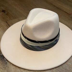 Cream felt rancher hat with custom designed Tim hat band